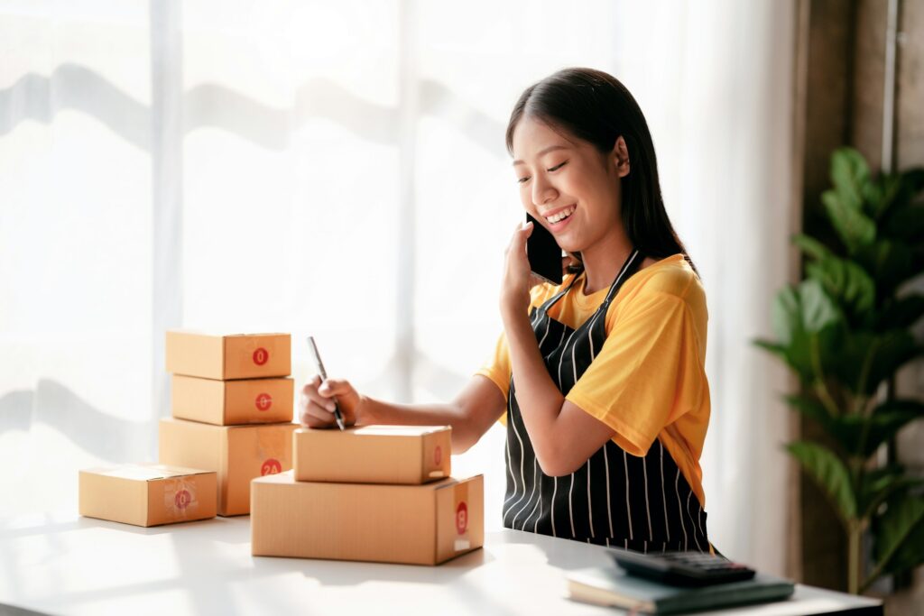 Small business parcel delivery concept, Female entrepreneur talk