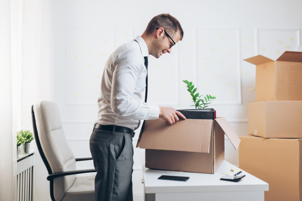 Businessman moving into a new office